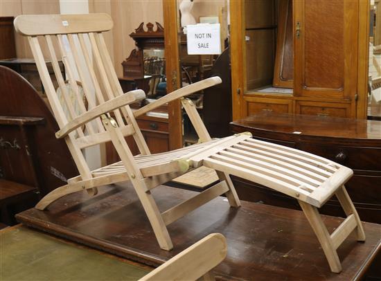 A pair of teak folding steamer chairs W.60cm